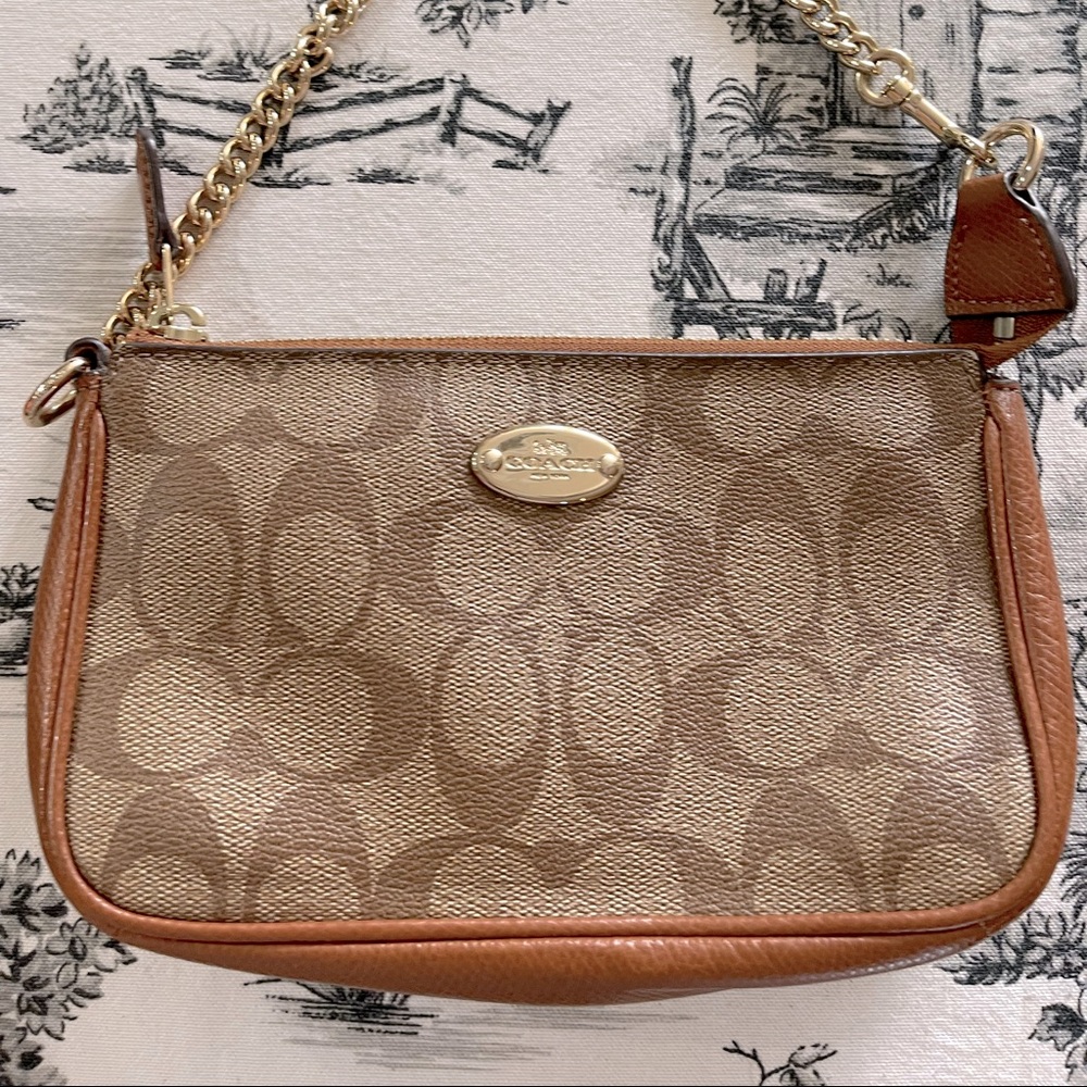 Coach signature monogram wristlet. Saddle and tan